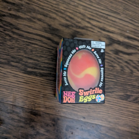 Nee Doh NeeDoh Swirlie Eggs Stress Toy by Schylling - Red Orange & Yellow Swirl - Picture 2 of 6